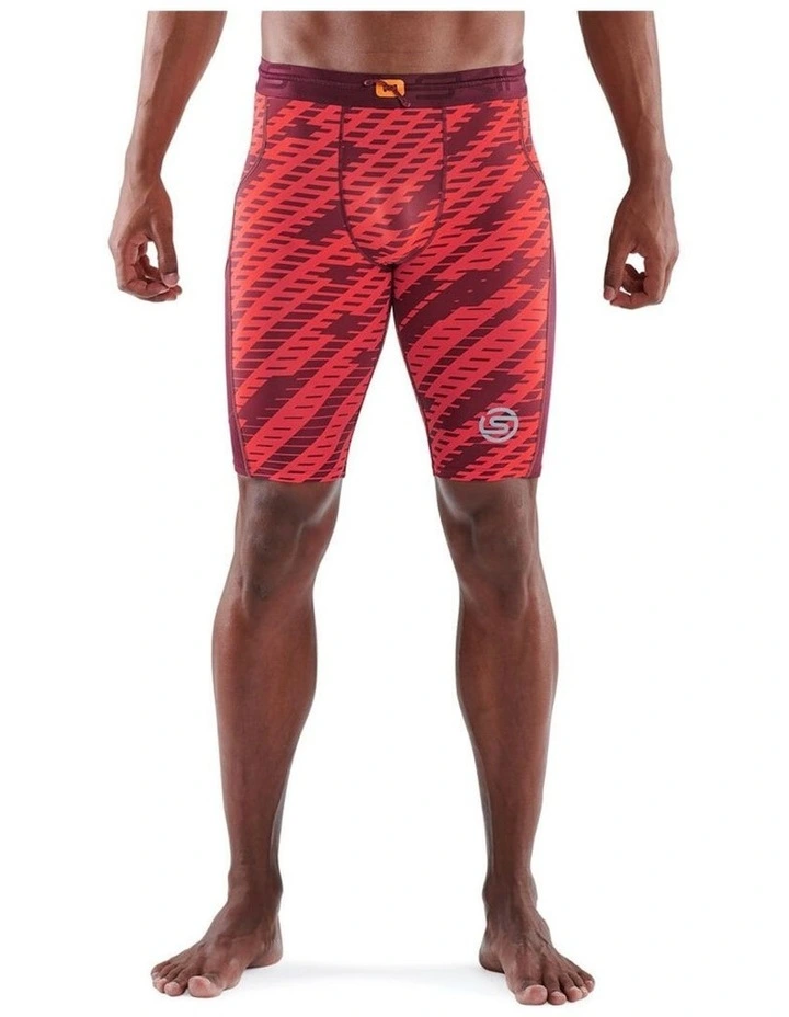 SKINS Series 3 Compression Half Tights Activewear In Orange 3 SKINS Series 3 Compression Half Tights Activewear In Orange