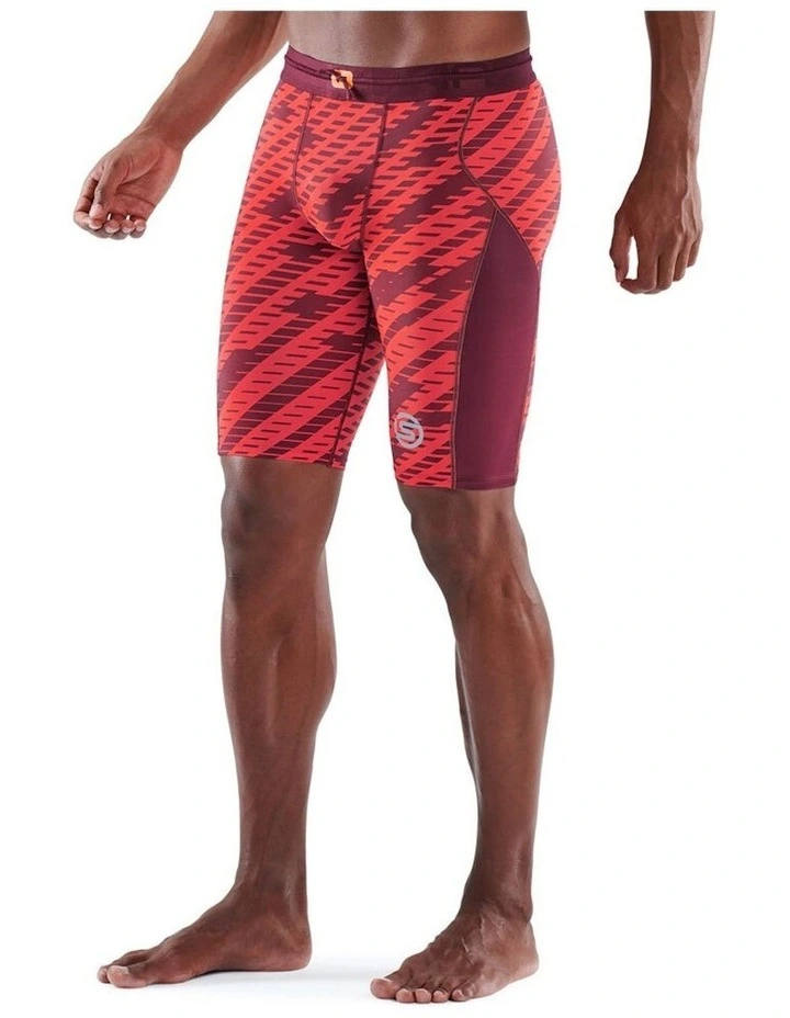 SKINS Series 3 Compression Half Tights Activewear In Orange 4 SKINS Series 3 Compression Half Tights Activewear In Orange - Image 2